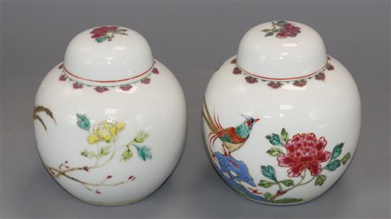 A pair of Chinese famille rose ginger jars and covers